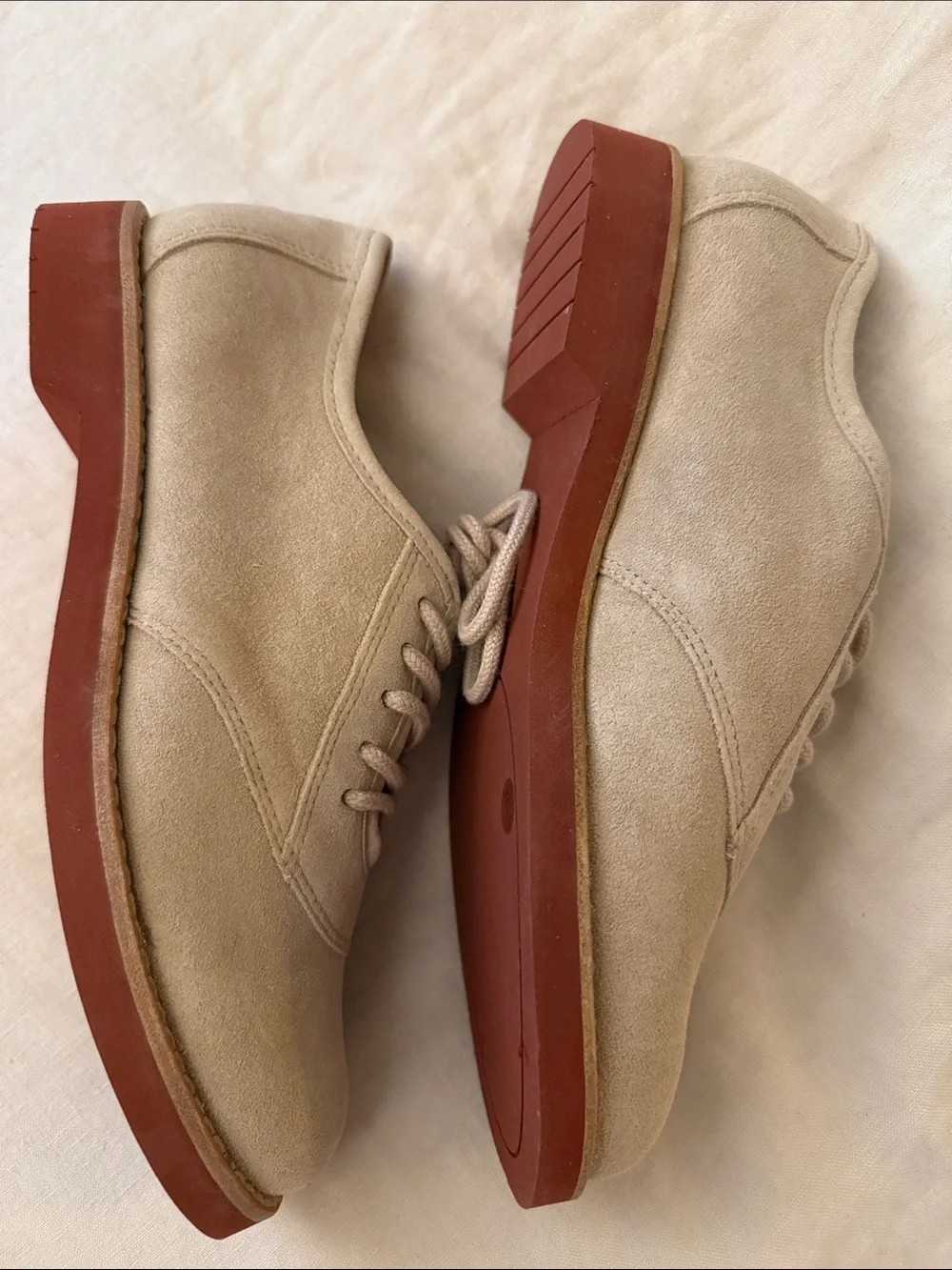 Beige Suede Lace-Up loafers.
